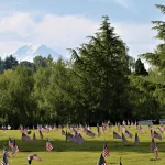 2025 Memorial Day Event at BONNEY WATSON flags at cemetery overlooking Mountains